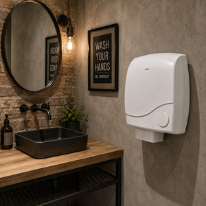 VEGA electric hand dryer in an industrial-style guest bathroom