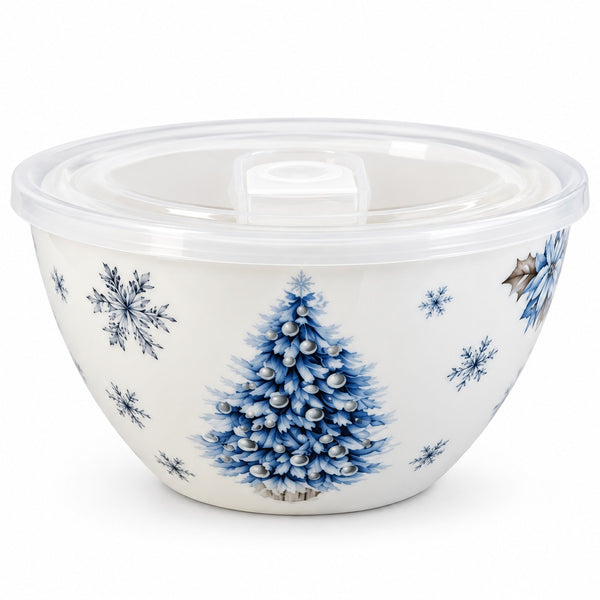 A white ceramic bowl with a clear plastic lid, decorated with a blue Christmas tree and snowflakes, on a white background.